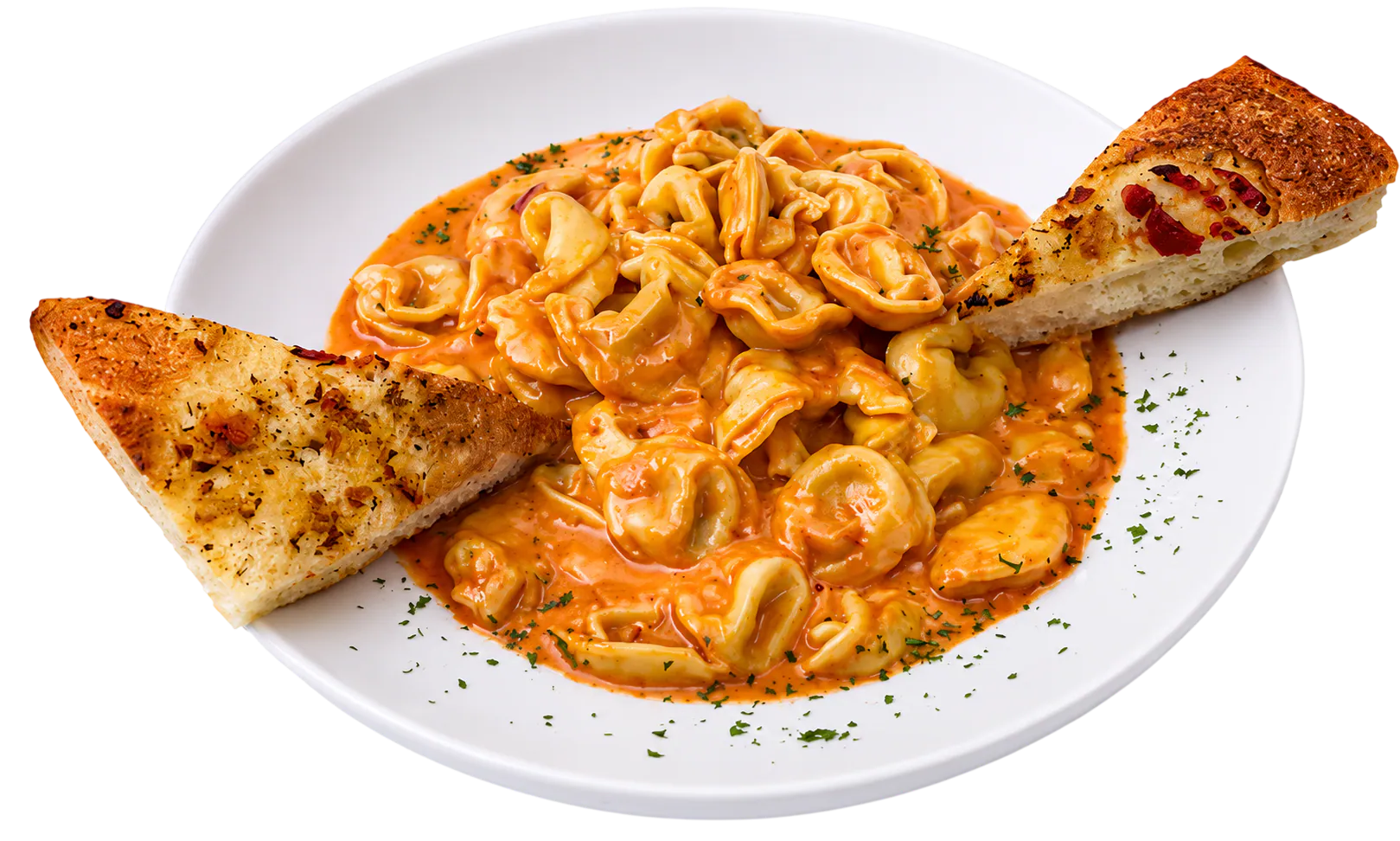 Plate of tortellini pasta in creamy tomato sauce with two slices of garlic herb bread.